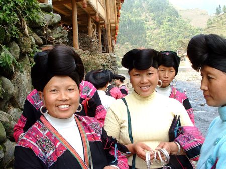 Women from Guangxi and Guizhou provinces wearing traditional dress